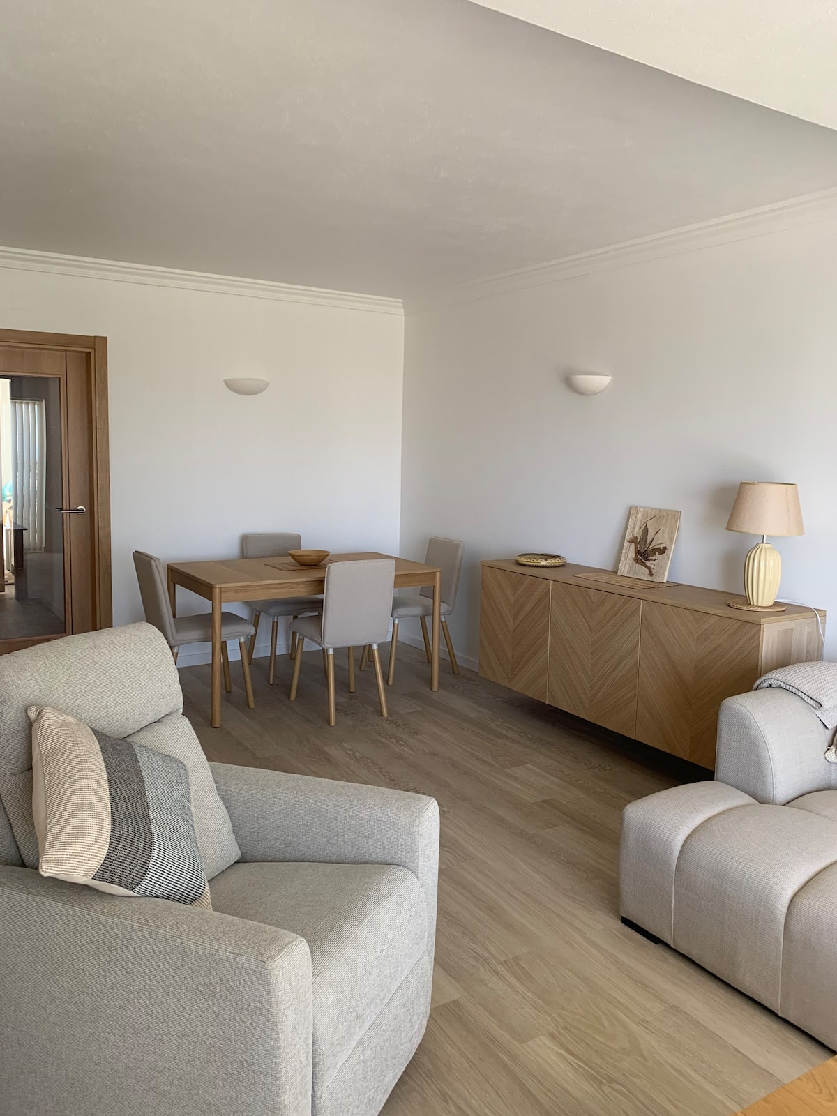 Living room with television and dining space