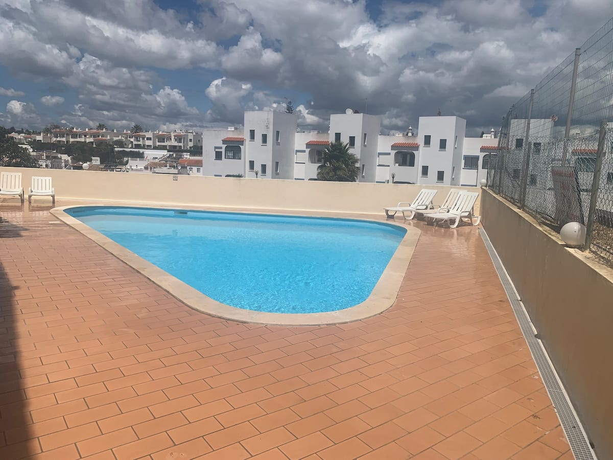 Pool area beside the apartments