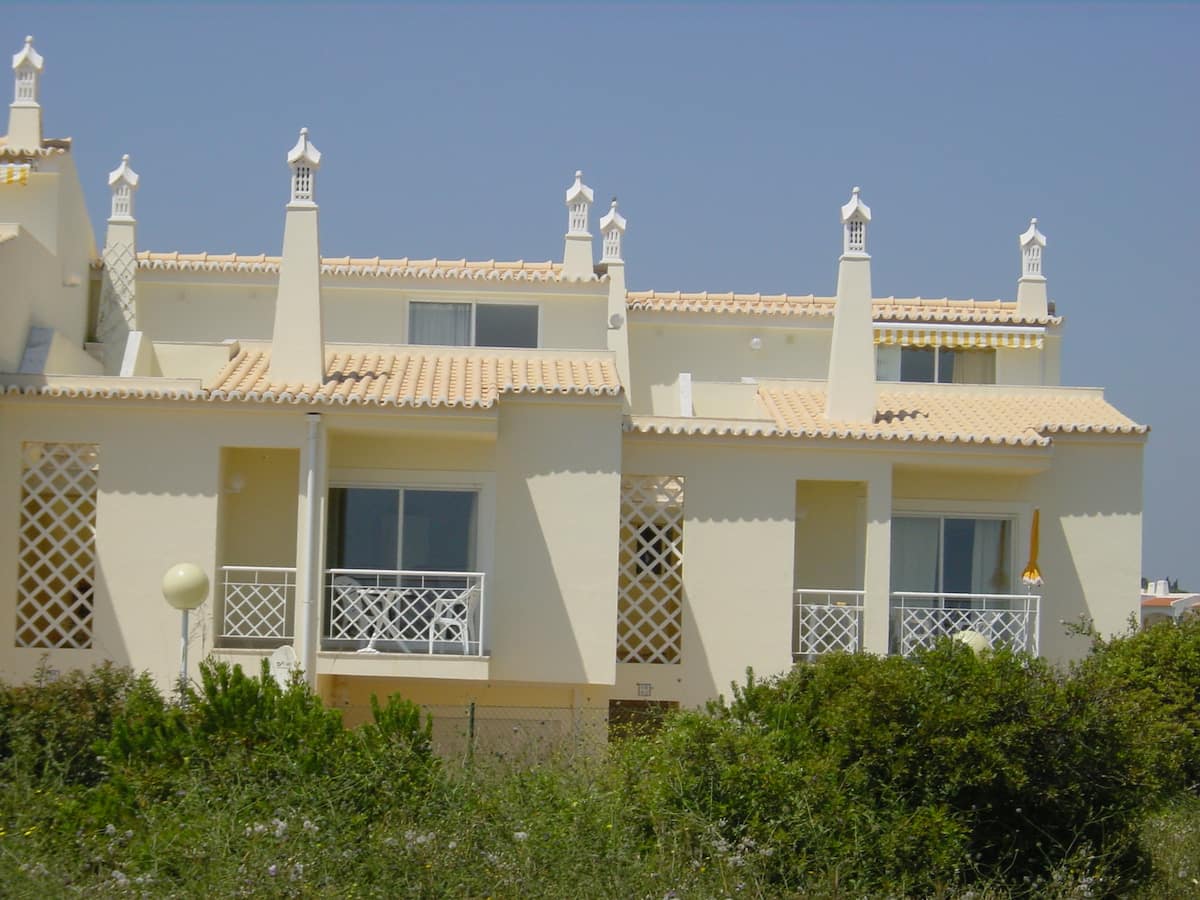 Sea-view terrace at the two-bedroom Carvoeiro apartment