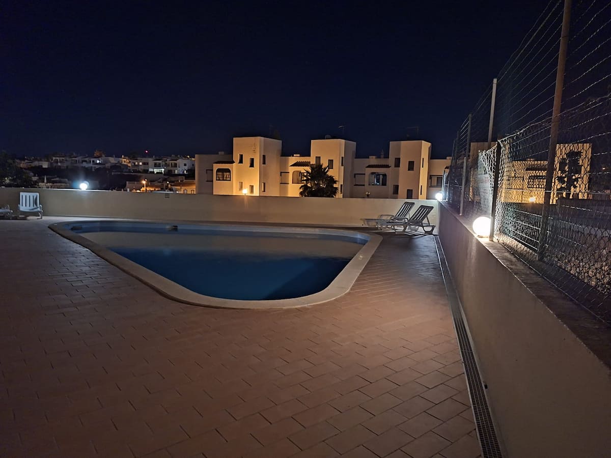 Communal pool with sun loungers