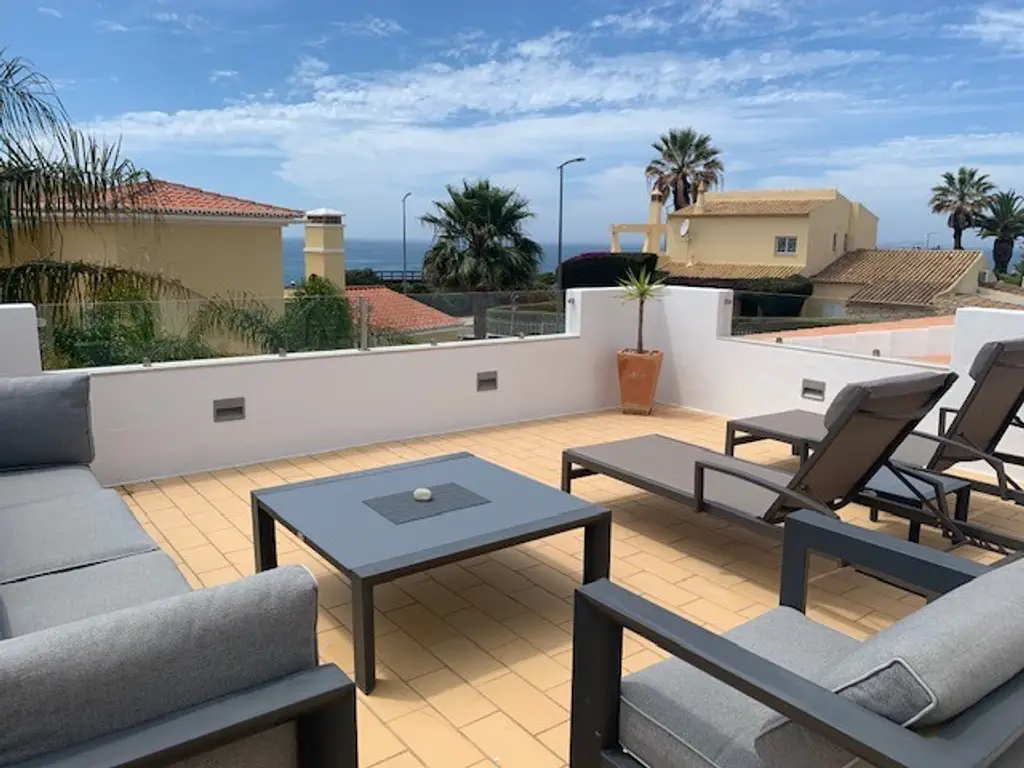 Atlantic-facing upstairs terrace with sun loungers