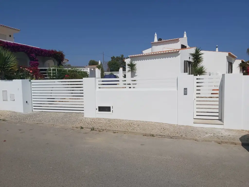 Secure gated entrance and private driveway