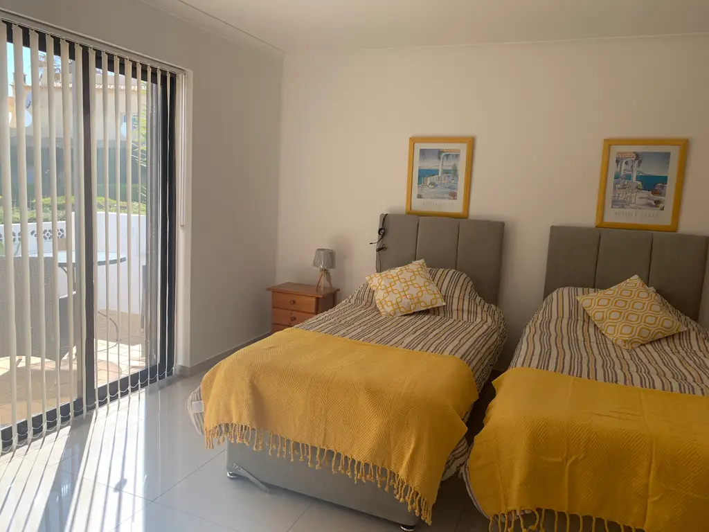 Villa twin bedroom with natural light