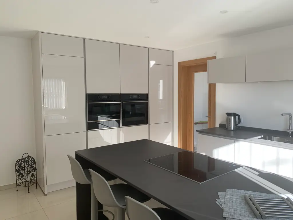Modern kitchen island and breakfast seating